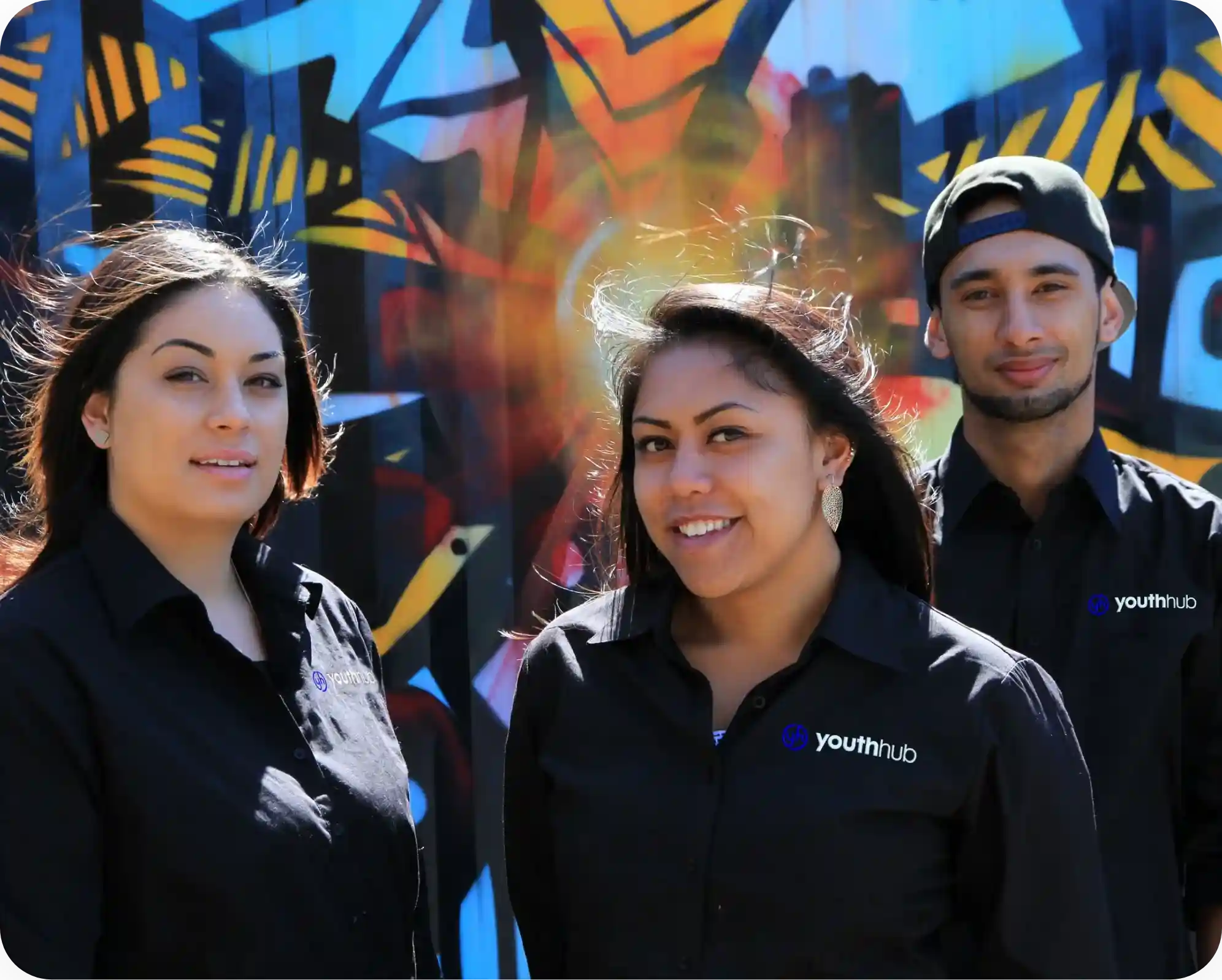 Three young people who are part of the YouthHub platform.